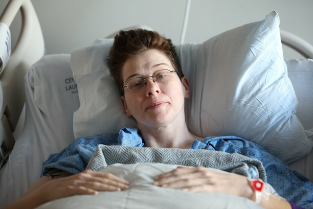 Woman recovering after having a surgery.