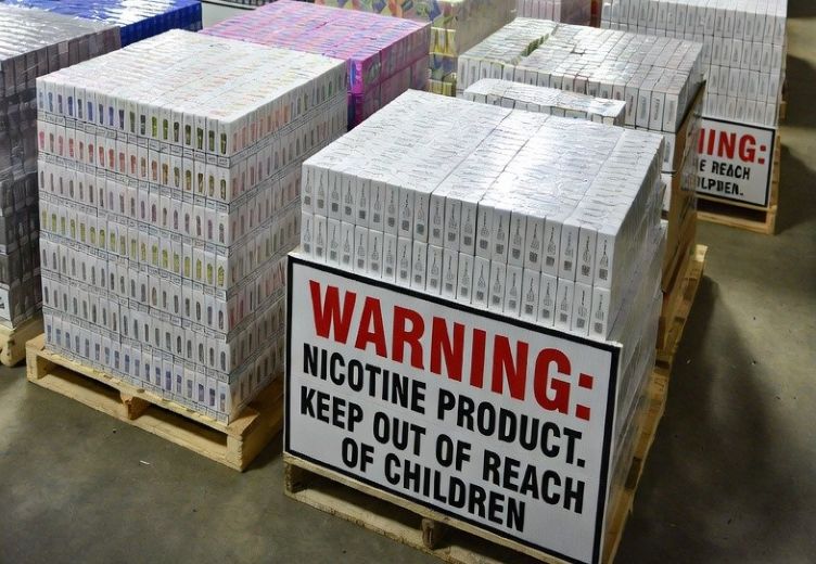 a vape shop wholesale warehouse with boxes of disposable vapes